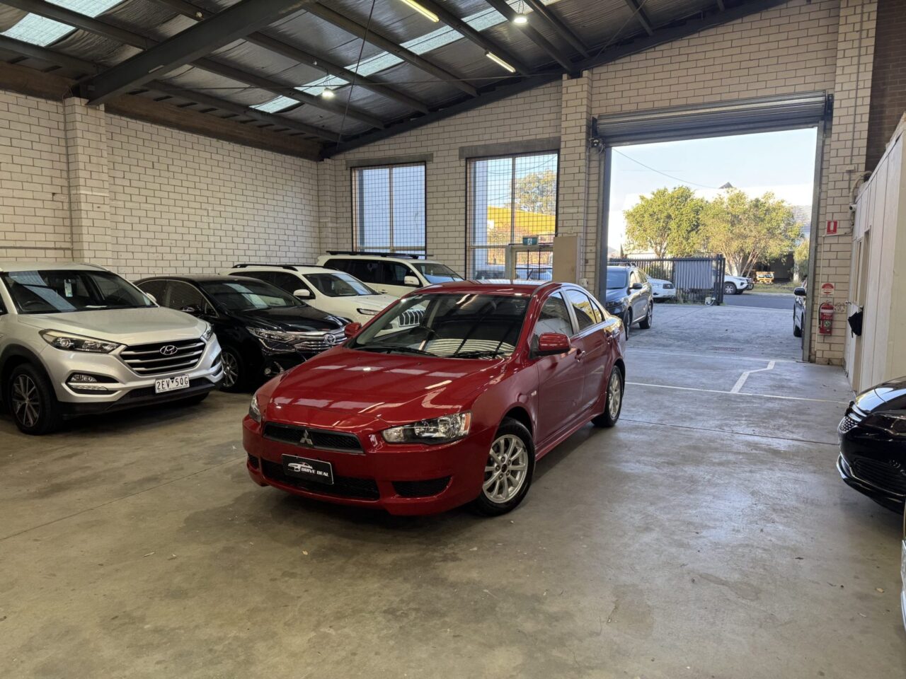 2010 Mitsubishi Lancer Lancer X Sedan/Saloon Petrol Automatic red for sale at Drive Deals image 1
