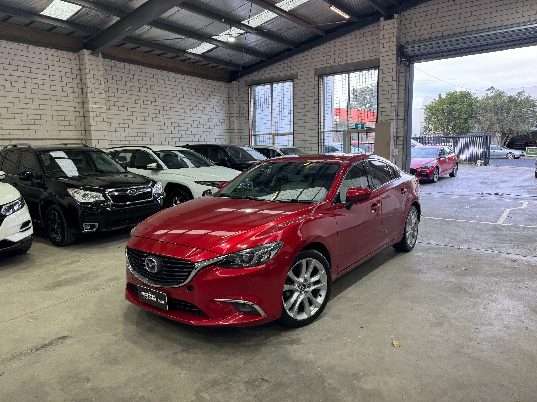 2016 Mazda 6 GT SKYACTIVE-DRIVE Wagon Petrol Automatic red for sale at Drive Deals image 1